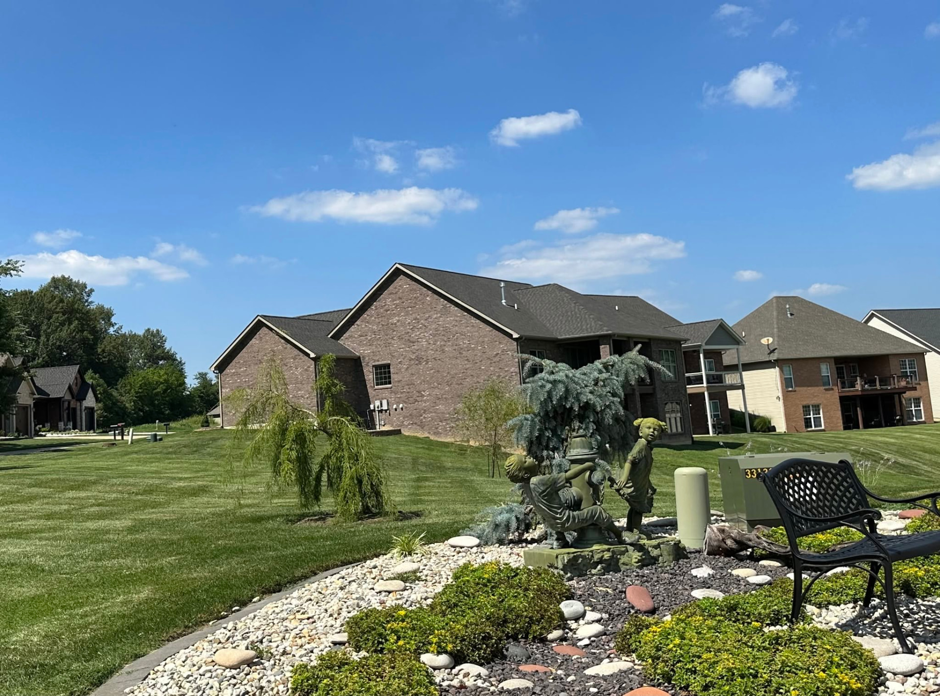 Finished landscape garden with decorative stone and ornamental plants
